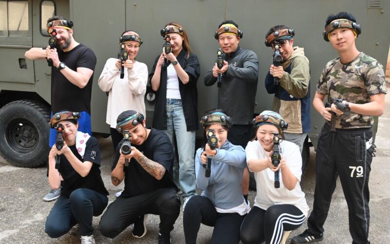 SEO Butler team posing with laser tag gear
