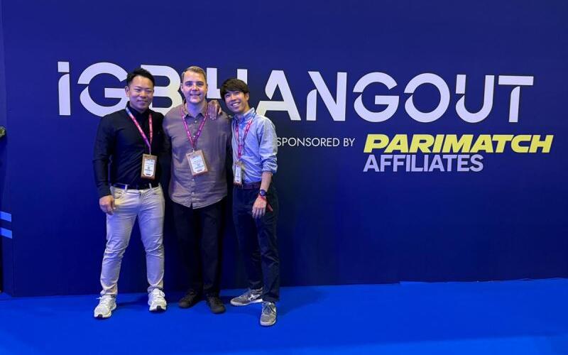 SEO Butler team members on stage at an iGaming industry event