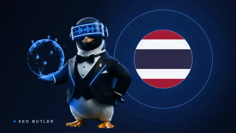 SEO Butler penguin butler holding a glowing globe beside the Thai flag - Thailand link building and SEO