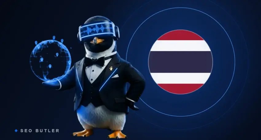 SEO Butler penguin butler holding a glowing globe beside the Thai flag - Thailand link building and SEO
